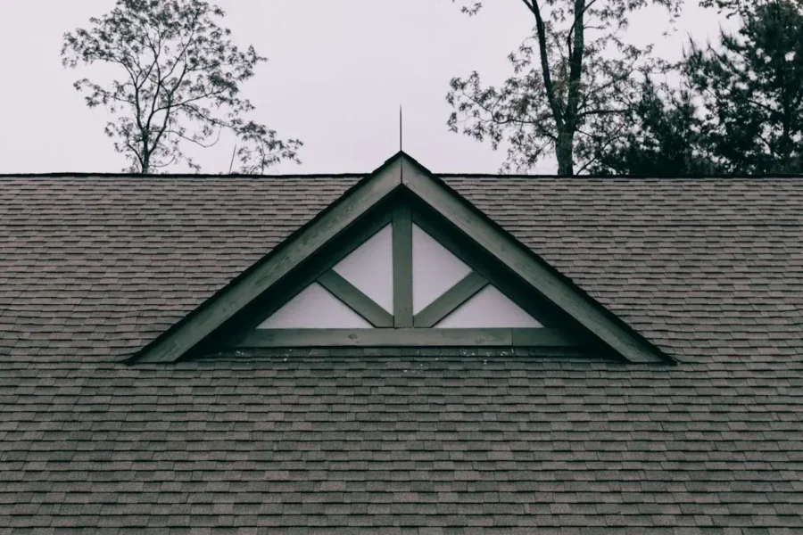 Asphalt shingle roof with a decorative gable
