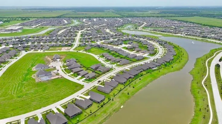 Aerial view of a Pflugerville neighborhood by the lake