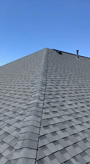The same shingle roof after the repair